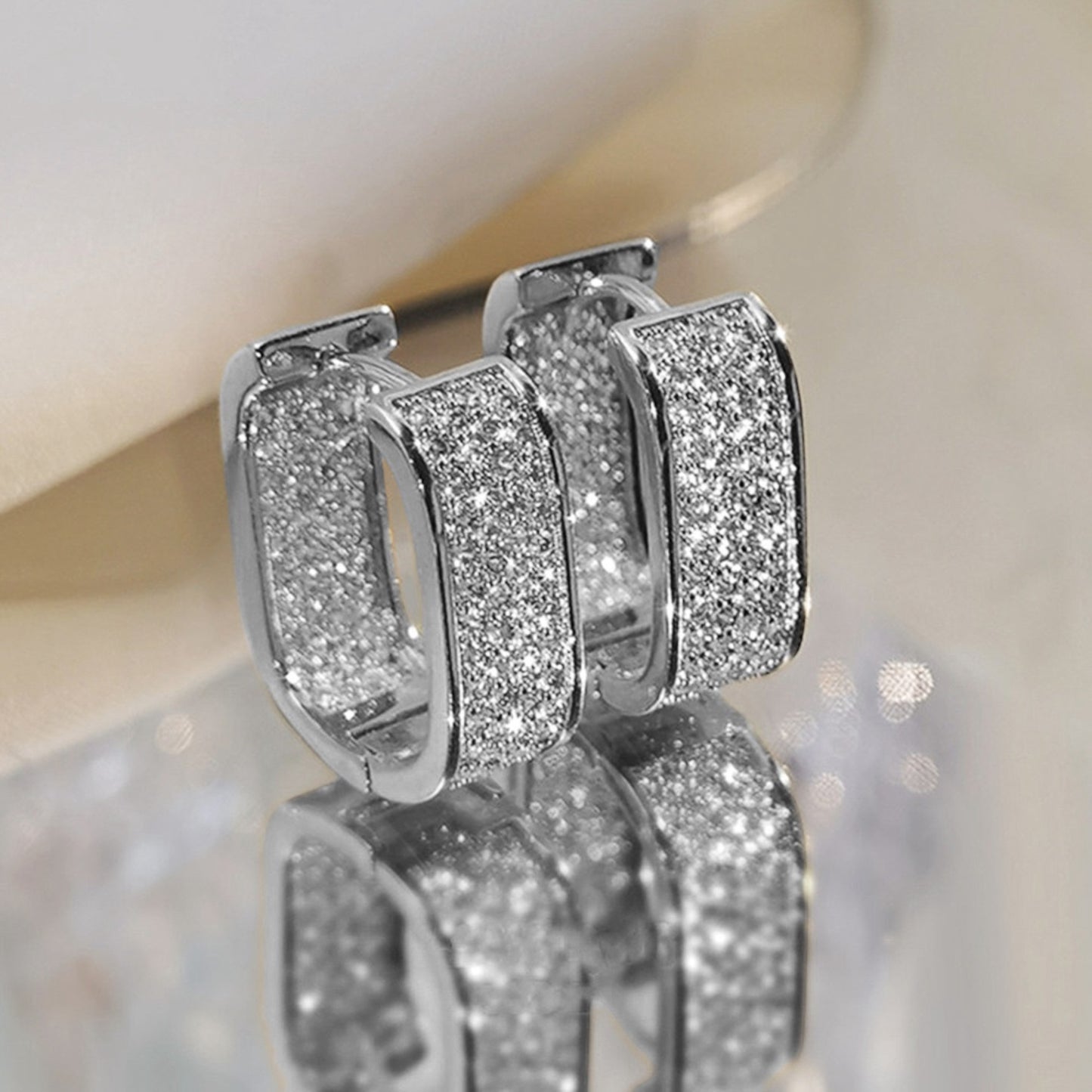 BOUCLES D’OREILLES U