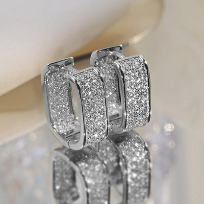 BOUCLES D’OREILLES U